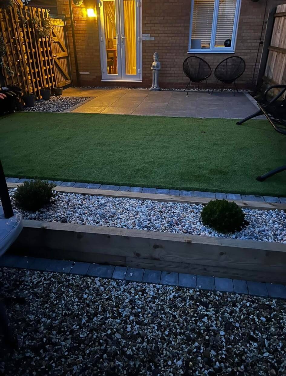 Complete rear garden transformation with paving, lawn and planting