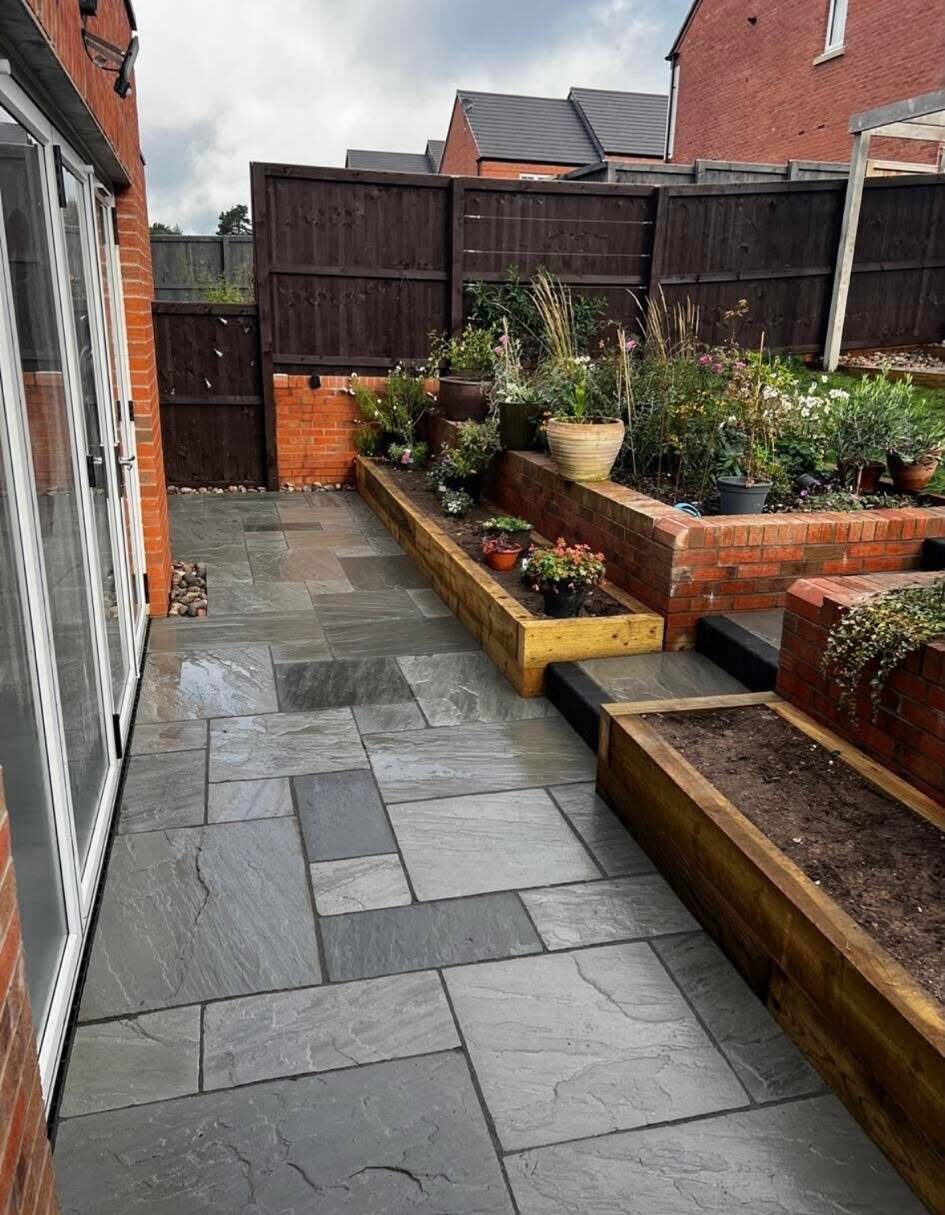 Landscaped back garden with new paved patio area