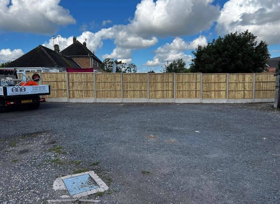 Professional timber fence installation in a residential garden