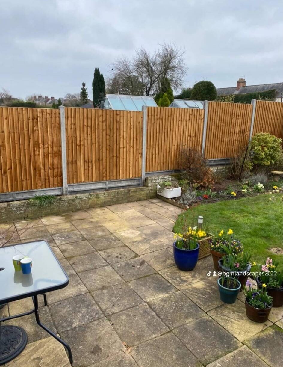 New timber garden fencing installed around a residential property
