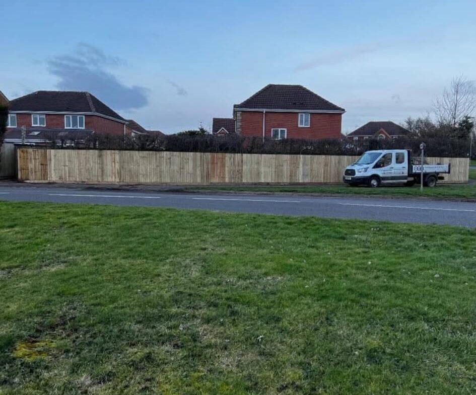 New garden fence installed to define a property boundary