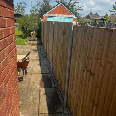 Garden boundary with newly installed timber fencing
