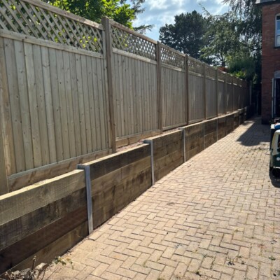 New tall fencing on the side of the house