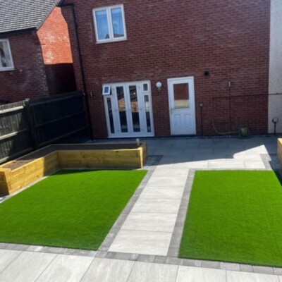 Garden patio surrounded by lawn